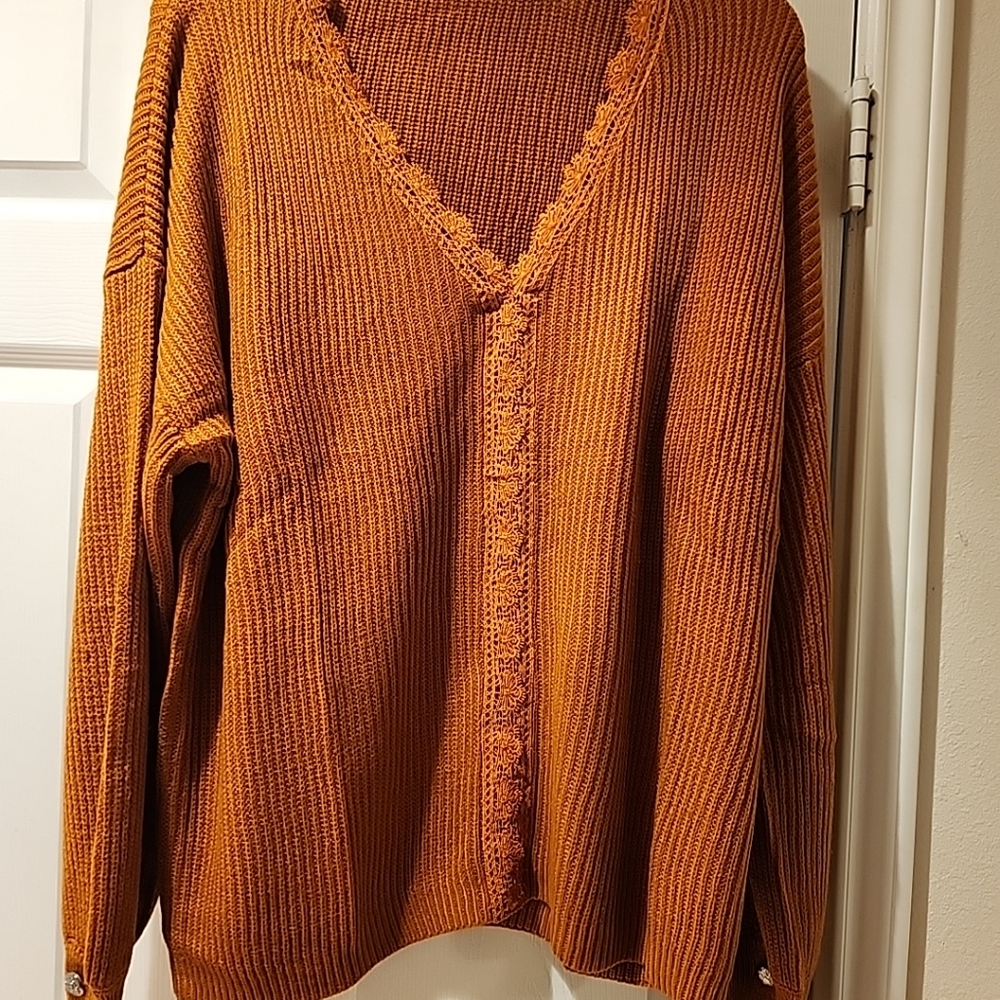 Crocheted vneck long sleeve sweater